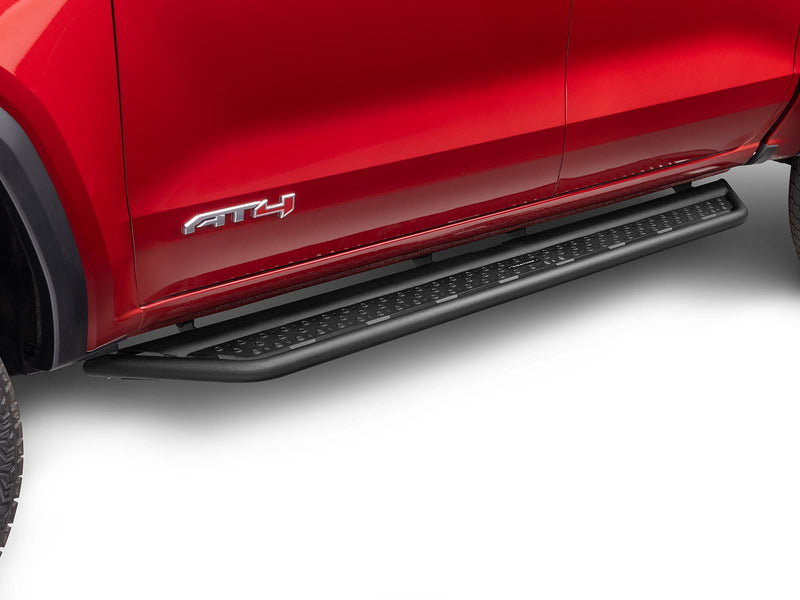 Go Rhino Dominator D6: black side step under the doors of a red GMC Canyon AT4, low side view