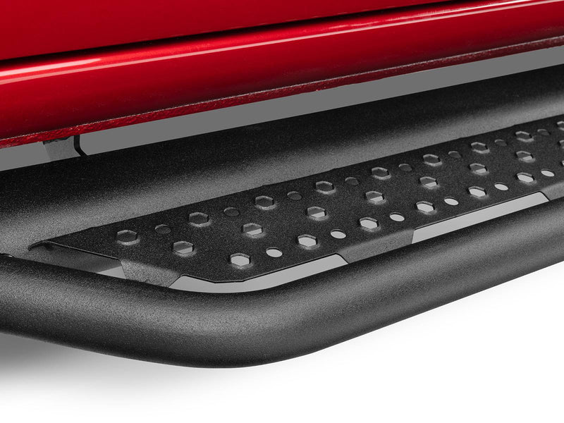 Go Rhino Dominator D6: close-up of a textured black side step tread and tube under a red body