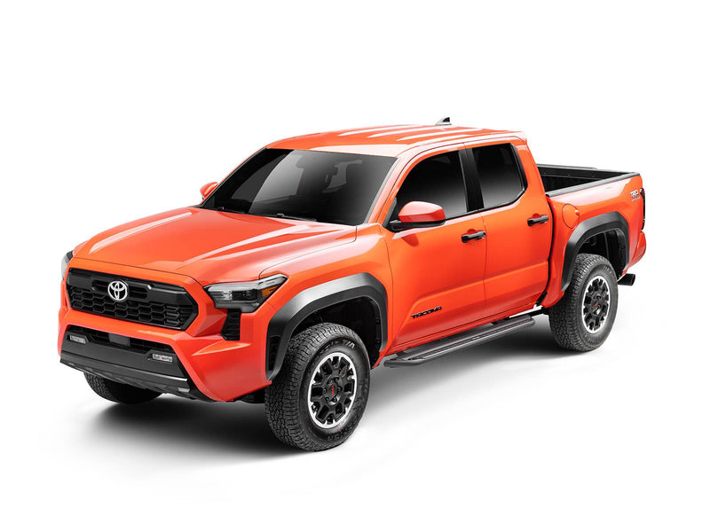 Go Rhino Dominator DSS: orange midsize pickup with black slider boards mounted under both doors, front three quarter view
