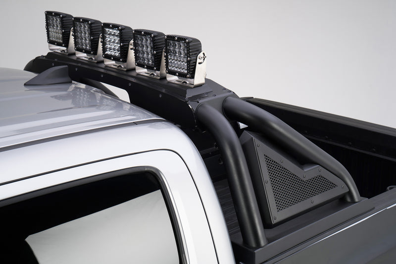 Go Rhino Sport Bar 2.0: black sport bar with five cube lights installed behind the cab of a silver pickup (shown with five cube lights, not included)