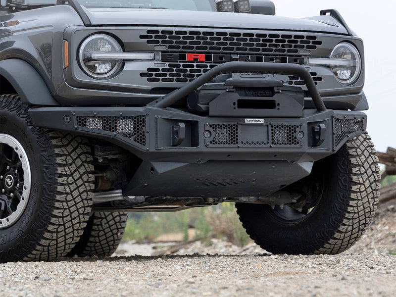 Gray SUV front from a low angle with a textured black winch bumper and lower skid plate fitted