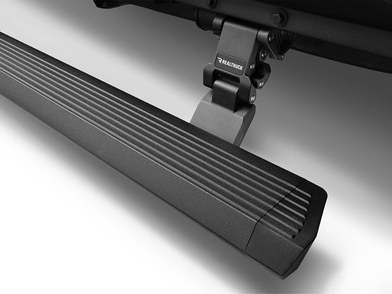 Textured black power running board deployed, close-up of the ribbed step, end cap and hinge arm