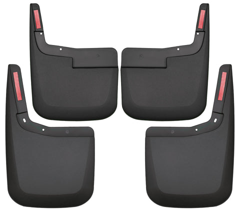 Husky Liners Custom Molded: set of four black custom-molded mud guards, front and rear pairs, on a white background (representative image; each guard is molded for its own vehicle)