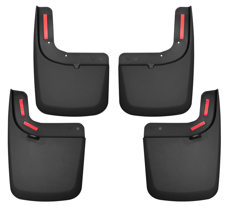 Husky Liners Custom Molded: set of four black molded mud guards with red reflectors, front and rear pairs, on a white background