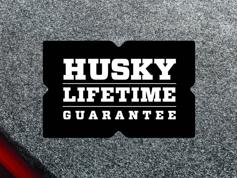 Husky Liners Guardian Comfort: HUSKY Lifetime Guarantee logo over gray carpet texture
