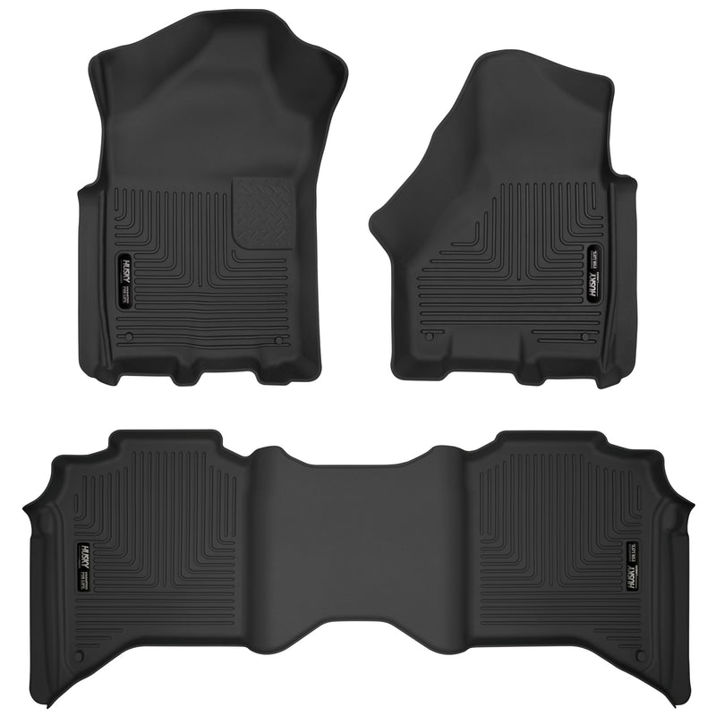Husky Liners X-act Contour: black molded front floor liner pair with matching rear floor liner with Husky Liners logo plates on a white background
