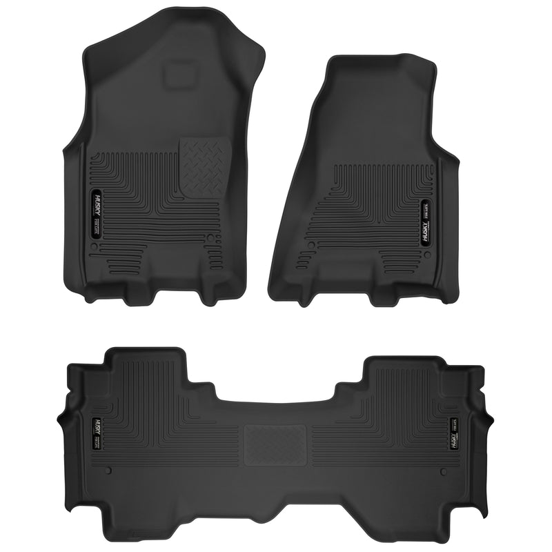 Husky Liners X-act Contour: black molded front floor liner pair with matching rear floor liner with Husky Liners logo plates on a white background