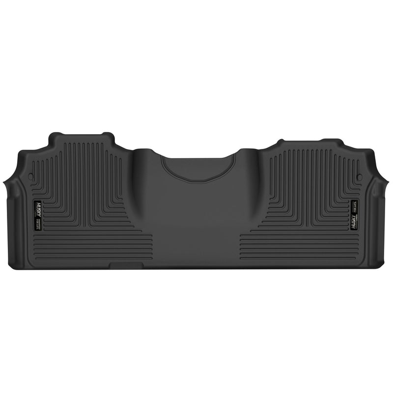 Husky Liners X-act Contour: black molded one-piece rear floor liner with Husky Liners logo plates on a white background