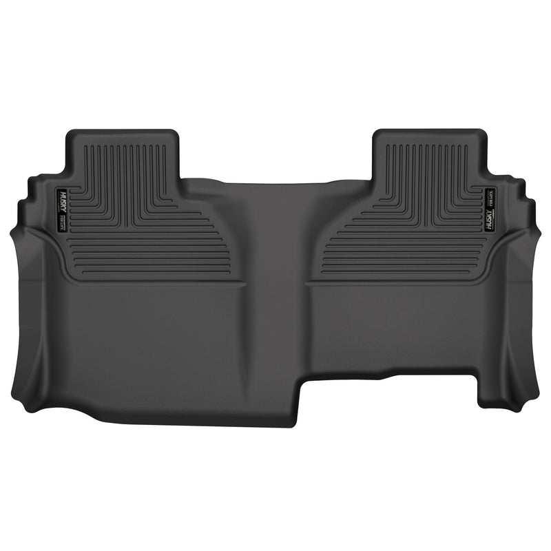 Husky Liners X-act Contour: black molded one-piece rear floor liner with Husky Liners logo plates on a white background