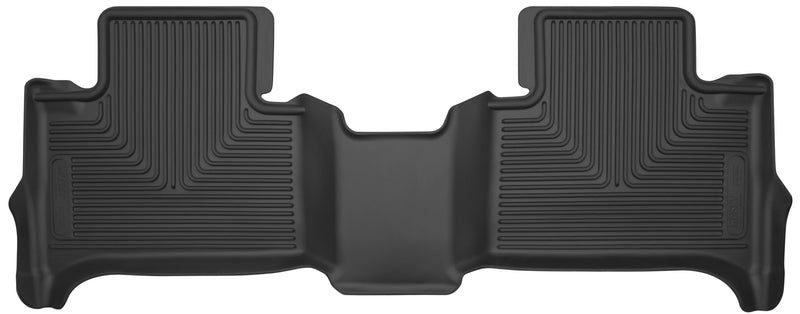 Husky Liners X-act Contour: black molded one-piece rear floor liner with Husky Liners logo plates on a white background