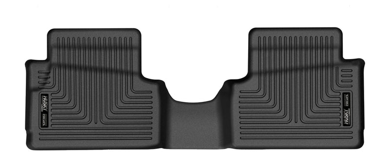 Husky Liners X-act Contour: black one-piece rear floor liner with a center hump section on white