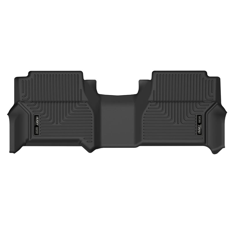 Husky Liners X-act Contour: black X-act Contour one-piece second-row floor liner on a white background