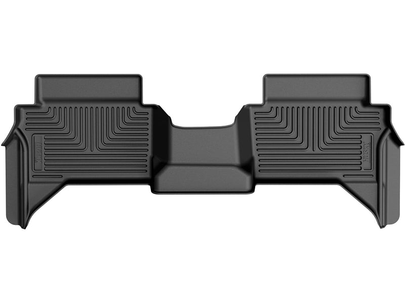 Husky Liners X-act Contour: black X-act Contour one-piece second-row floor liner on a white background