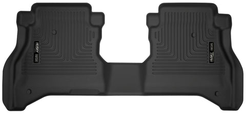 Husky Liners X-act Contour: black X-act Contour one-piece second-row floor liner on a white background
