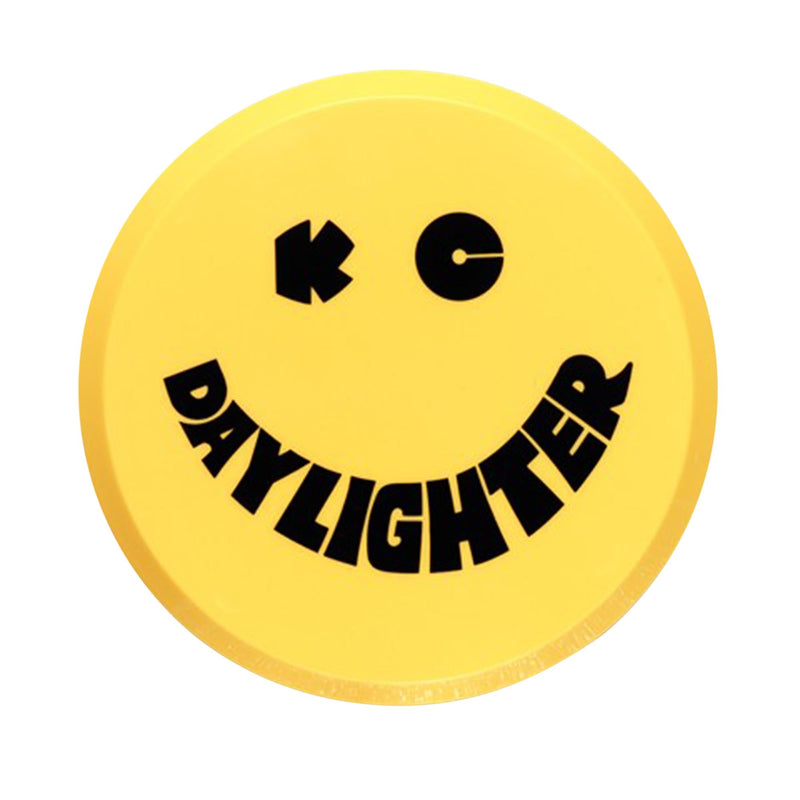 KC HiLiTES 6" Round Light Cover & Shield on a studio background: round yellow hard plastic KC Daylighter light cover with a black smiley face logo on a white background