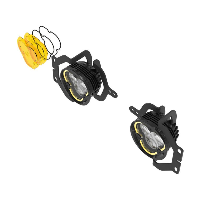 KC HiLiTES FLEX ERA 3 Dual-Mode SAE Fog Light Kit, Sport Bumper on a studio background: exploded view of two FLEX ERA 3 fog lights on mounting brackets with selective yellow lenses