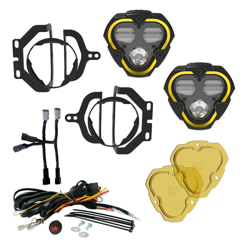 KC HiLiTES FLEX ERA 3 Dual-Mode SAE Fog Light Kit, Sport Bumper on a studio background: FLEX ERA 3 fog light kit laid out: two lights, Jeep mounting brackets, harness adapters, wiring harness with switch and two yellow lenses
