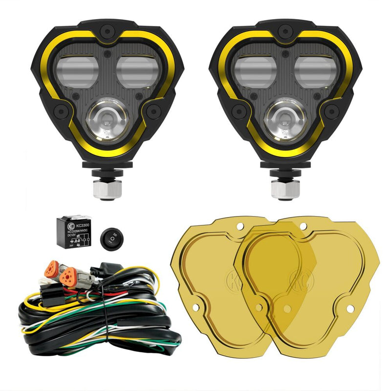 KC HiLiTES FLEX ERA 3 Dual-Mode SAE Fog Light Master Kit on a studio background: two FLEX ERA 3 Dual Mode fog LED lights with two selective yellow lenses, a wiring harness, relay and switch on a white background