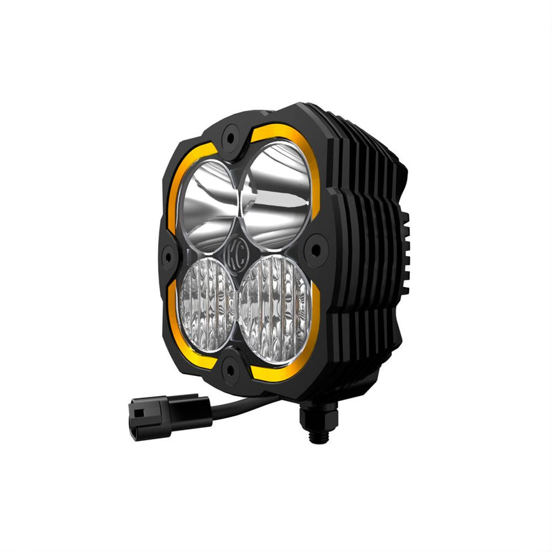 KC HiLiTES FLEX ERA 4 LED Light Pod Master Kit on a studio background: FLEX ERA 4 LED light with clear combo lens, amber accent ring and pigtail connector, angled front view