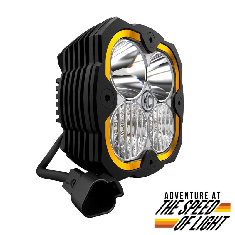 KC HiLiTES FLEX ERA 4 LED Light Pod Master Kit on a studio background: FLEX ERA 4 LED light with clear combo lens and amber accent ring, angled front view