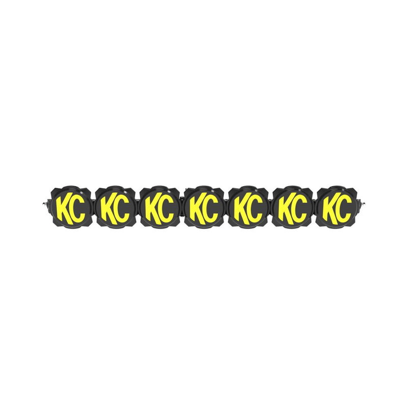 KC HiLiTES Gravity Titan 45" 7-Light Bumper LED Light Bar on a studio background: black seven light LED light bar with black and yellow KC covers on every light, front view on a white background