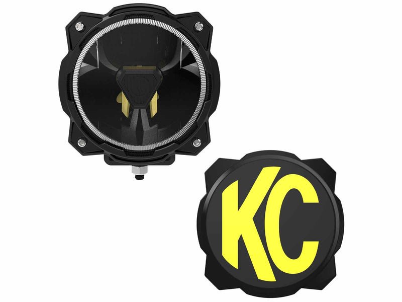KC HiLiTES Gravity Titan 6" LED Light on a studio background: front view of a round black LED off-road light with a halo ring beside its black and yellow KC cover