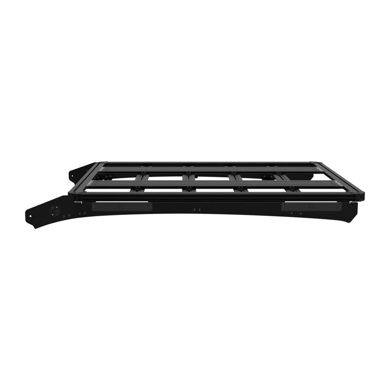 KC HiLiTES Platform One Roof Rack on a studio background: black aluminum KC Platform One roof rack with slotted crossbars and side mounting brackets, low side view on a white background