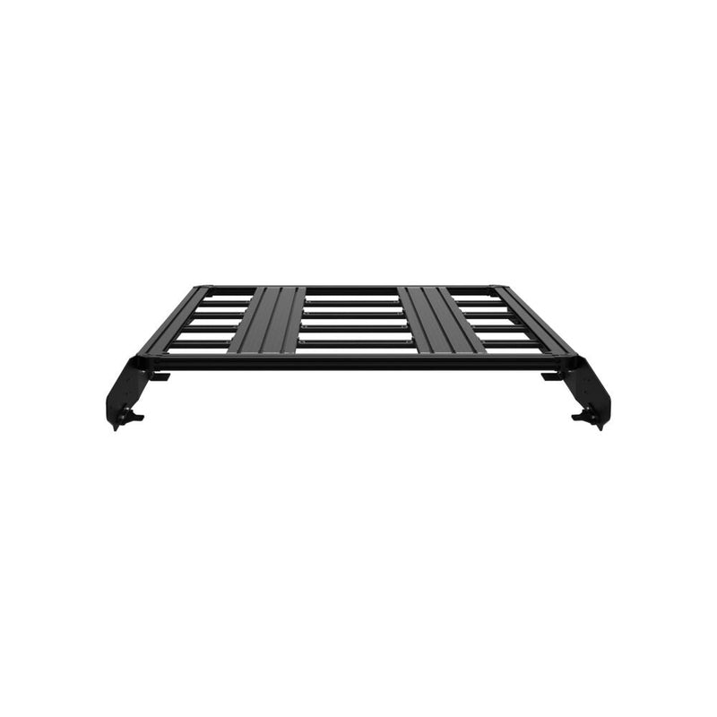 KC HiLiTES Platform One Roof Rack on a studio background: black aluminum KC Platform One roof rack with slotted crossbars and side mounting brackets, front view on a white background
