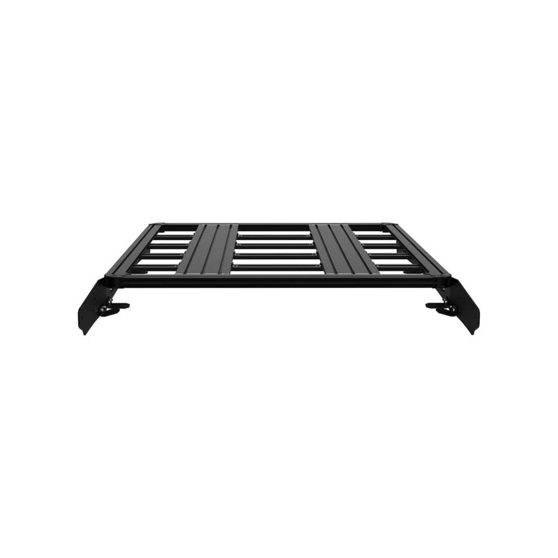 KC HiLiTES Platform One Roof Rack on a studio background: black aluminum KC Platform One roof rack with slotted crossbars and side mounting brackets, front view on a white background