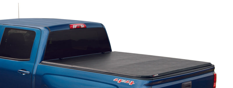 LEER Latitude soft tri-fold tonneau cover closed flat over a pickup bed, rear three-quarter view