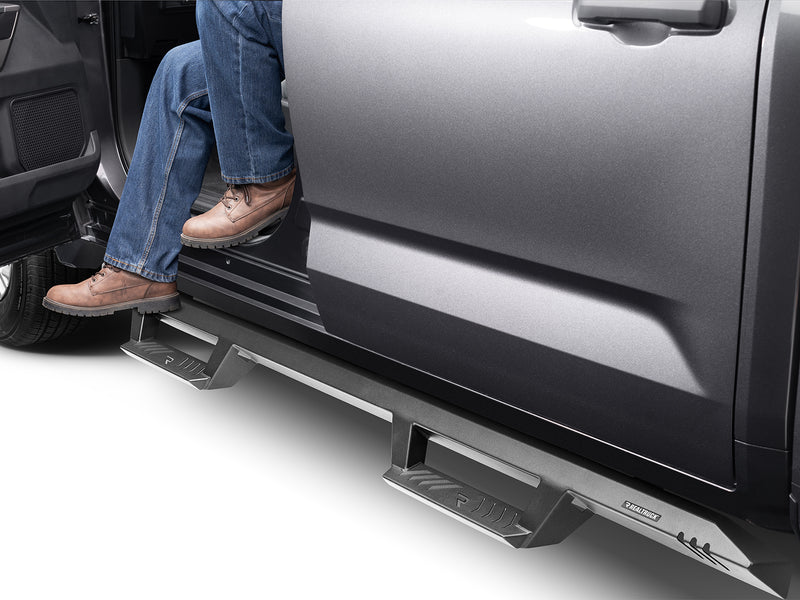 N-Fab EpYx nerf steps in textured black, boot on the step at an open door