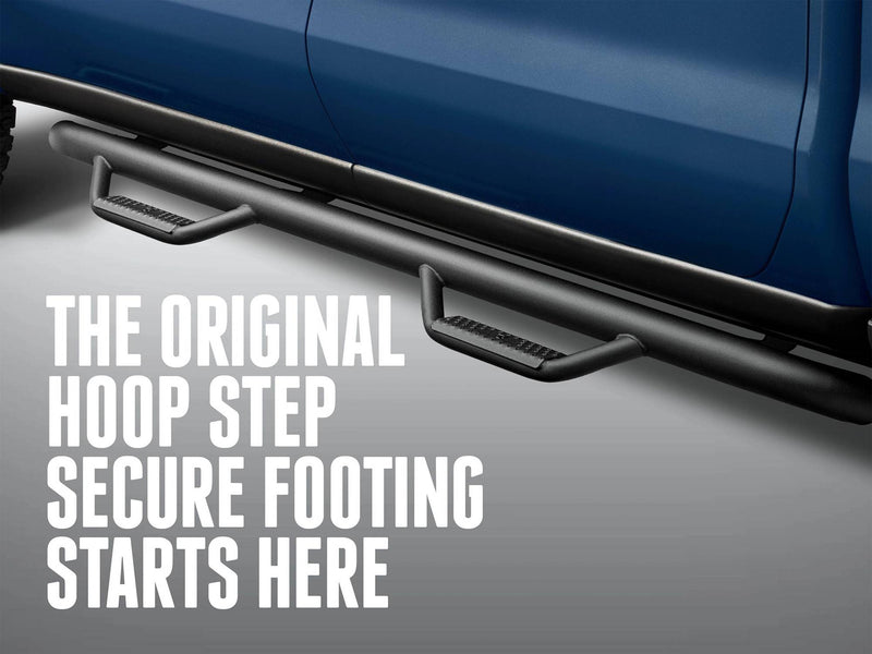N-Fab hoop steps below the doors of a blue pickup, captioned The original hoop step, secure footing starts here