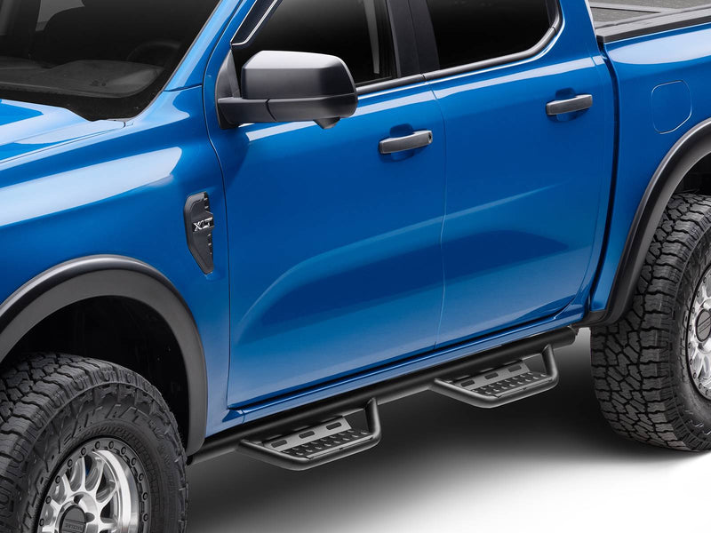 N-Fab Nerf Step RS step bars in textured black, installed along the rocker