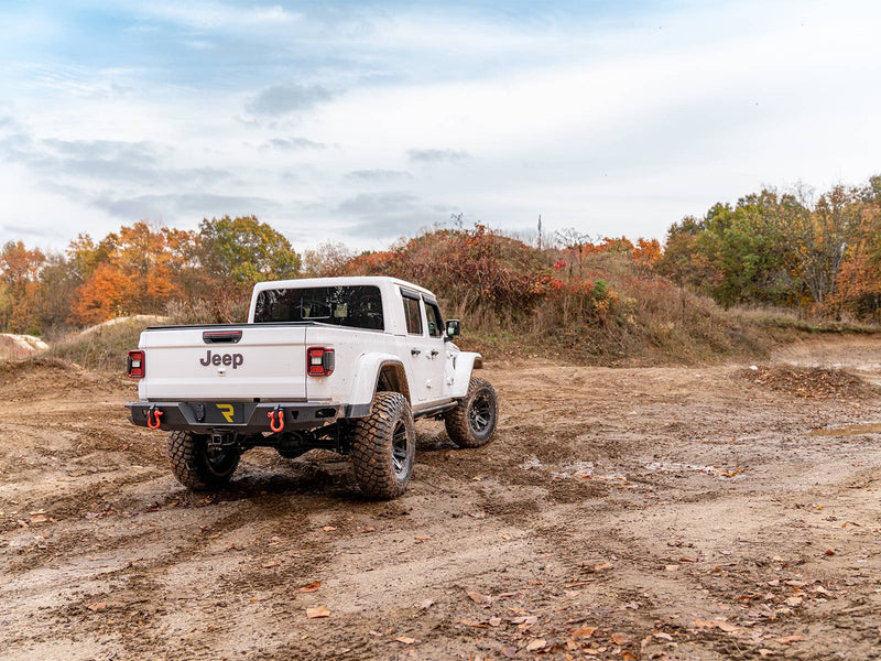 N-Fab TrailSlider step system in textured black, installed, vehicle seen, shown with a rear bumper (not included), on a Jeep Gladiator JT