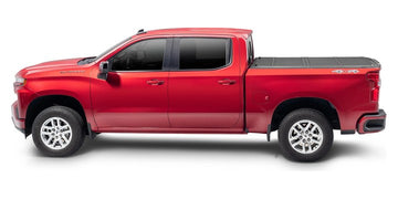Red 2020 Chevrolet Silverado 1500 with a BAKFlip G2 hard folding tonneau cover