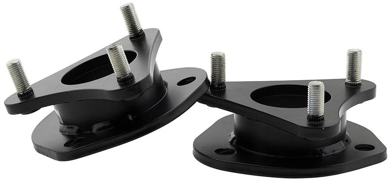 ReadyLIFT leveling kit: pair of black strut spacers with studs on white