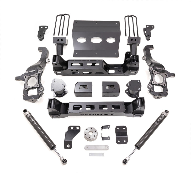 ReadyLIFT Big Lift Kit, full kit on a studio background: ReadyLIFT 6" F-150 kit with knuckles, crossmembers, skid plate, blocks, U-bolts and two Falcon rear shocks on white