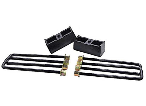 ReadyLIFT Block Kit, full kit on a studio background: two black cast rear lift blocks with four long square U-bolts and gold nuts on white
