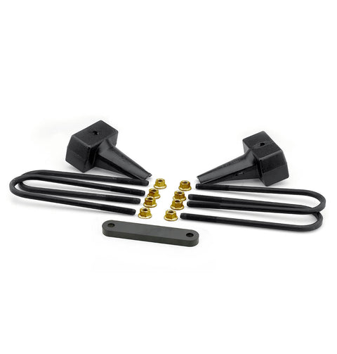 ReadyLIFT Block Kit, full kit on a studio background: two black tapered rear lift blocks with round U-bolts, gold nuts and a flat spacer plate on white