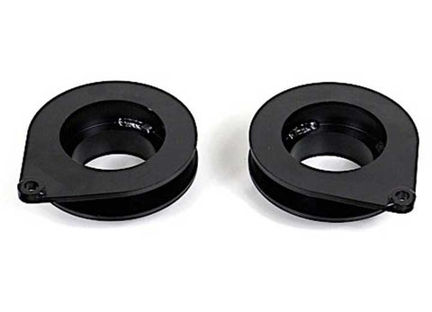 ReadyLIFT Coil Spacer, full kit on a studio background: two black rear coil spring spacers with locating tabs on white