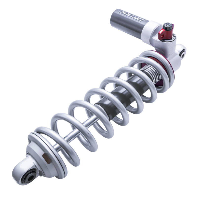 Close-up of the ReadyLIFT Coilover Front Lift Kit: single Falcon 3.3 coilover with silver spring and reservoir angled on a black background
