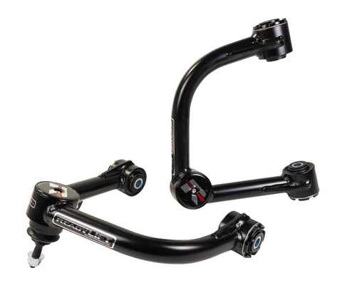 ReadyLIFT Leveling and Big Lift Upper Control Arms, full kit on a studio background: two black ReadyLIFT tubular upper control arms with red R caps on a white background