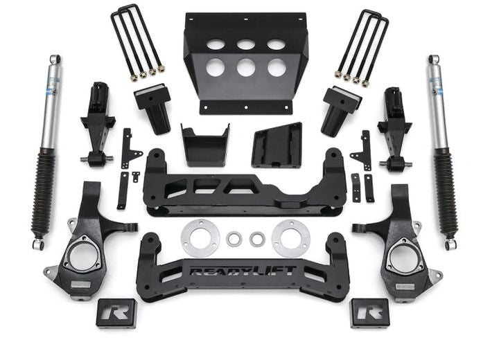 ReadyLIFT Lift Kit, full kit on a studio background: ReadyLIFT 7" GM 1500 kit with knuckles, crossmembers, skid plate, blocks, U-bolts and two Bilstein shocks on white