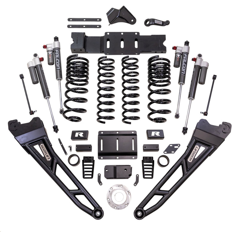 ReadyLIFT MAX3.3 Suspension System, full kit on a studio background: ReadyLIFT Ram 2500 kit with radius arms, coil springs, Falcon 3.3 reservoir shocks, crossmember and hardware on white