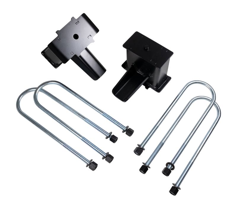 ReadyLIFT Mono-Leaf Rear Block Kit, full kit on a studio background: two tall black fabricated rear lift blocks with four zinc round U-bolts and nuts on a black background