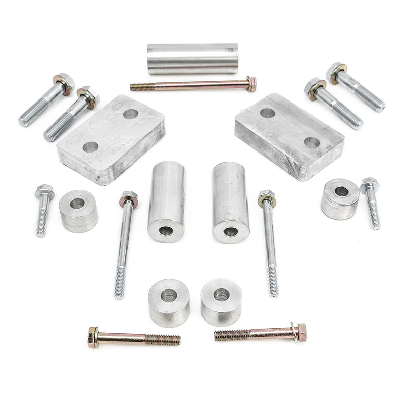 ReadyLIFT Skid Plate Spacer Kit, full kit on a studio background: aluminum spacer blocks, round spacers, sleeves and bolts on white