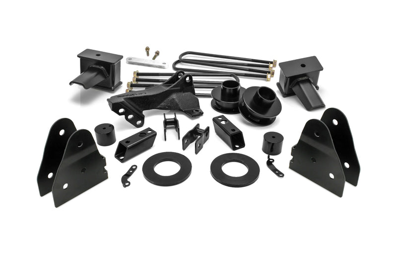ReadyLIFT SST Lift Kit, full kit on a studio background: black brackets, coil spacers, rear blocks, U-bolts and hardware laid out on white