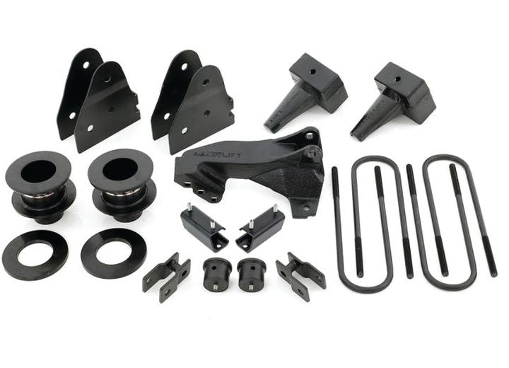 ReadyLIFT SST Lift Kit, full kit on a studio background: coil spacers, track bar bracket, shock brackets, tapered rear blocks and U-bolts on white