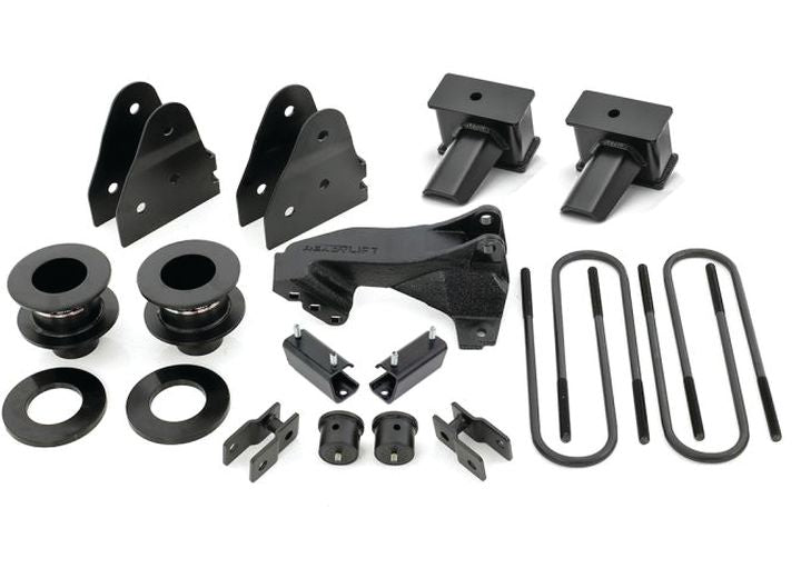 ReadyLIFT SST Lift Kit, full kit on a studio background: coil spacers, track bar bracket, shock brackets, fabricated rear blocks and U-bolts on white