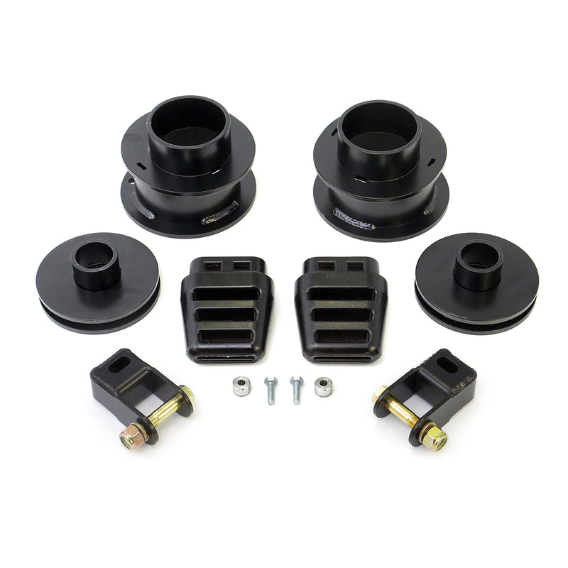 ReadyLIFT SST Lift Kit, full kit on a studio background: front and rear black coil spacers, bump stop extensions, two brackets and hardware on white